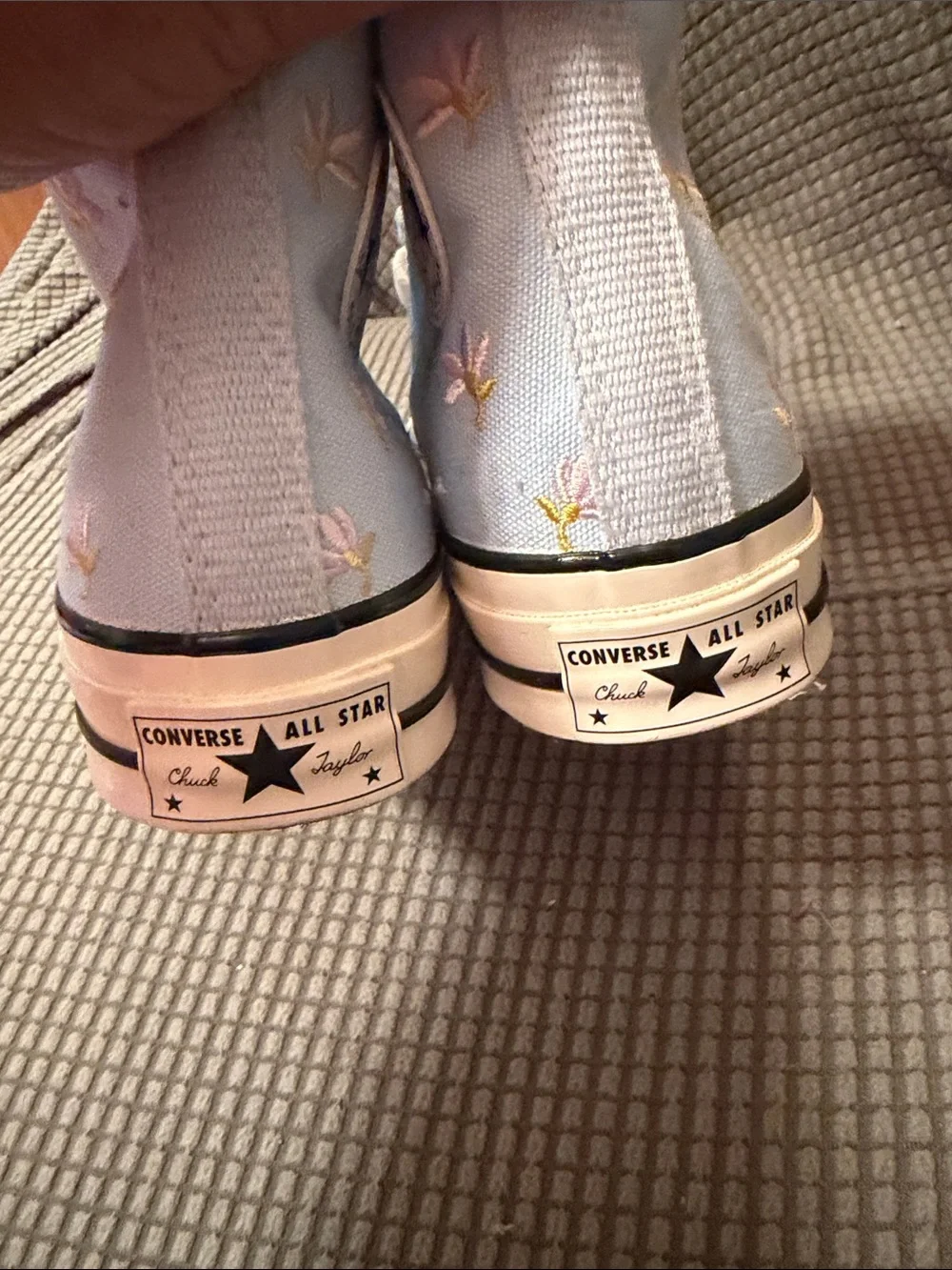 Converse Chuck Taylor light blue with purple flowers.   Mens 4. Womens 6